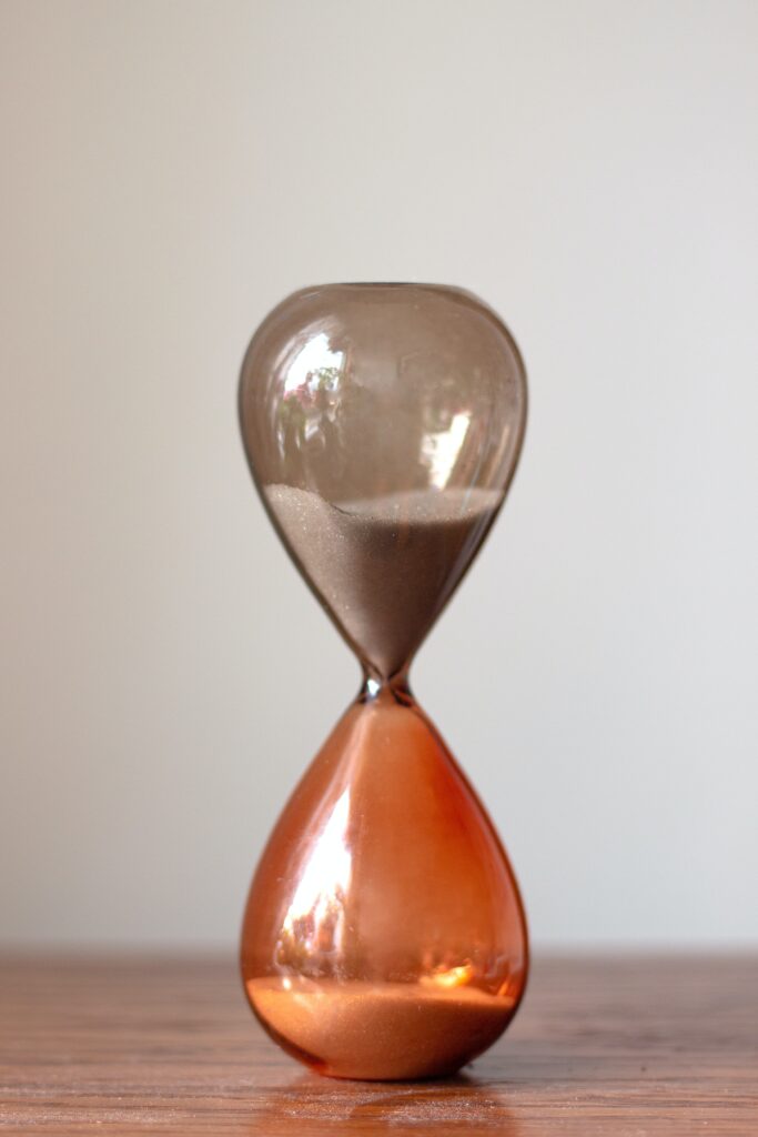 an hourglass on a table - lifestyle changes
